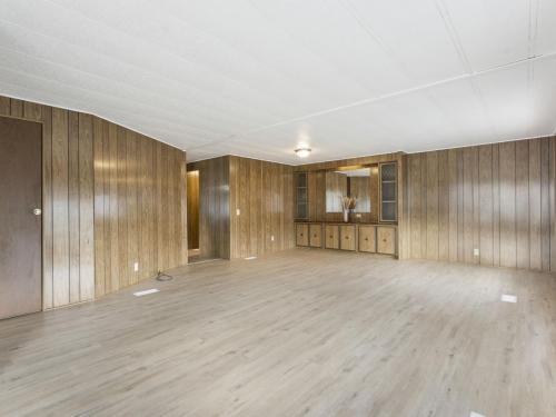 A room with wood paneling.
