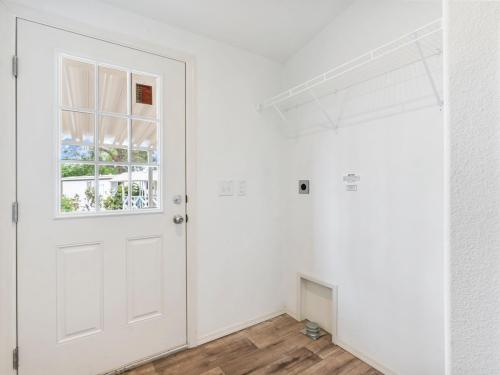 A white door in a room.